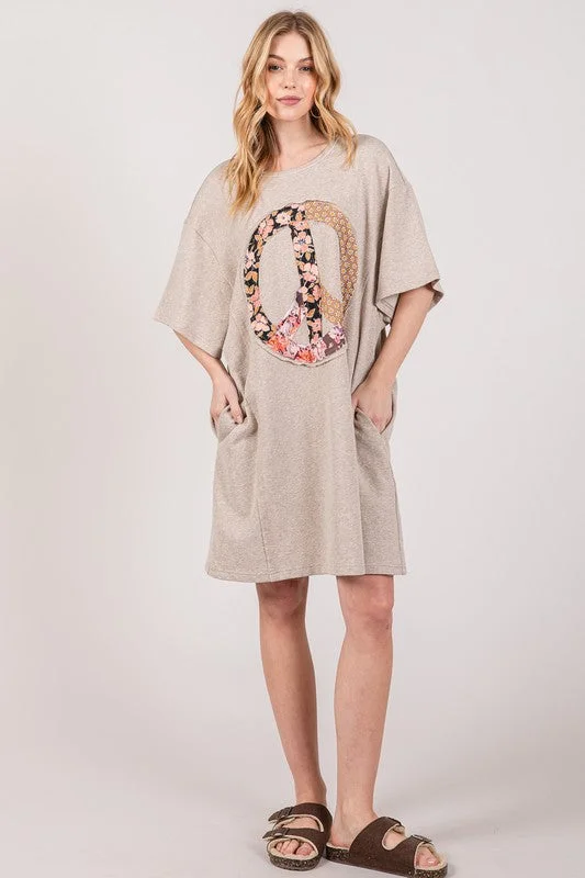 Sage+Fig Boyfriend Fit T-shirt Dress with Peace Sign Applique in Oatmeal Asymmetrical Pockets Print